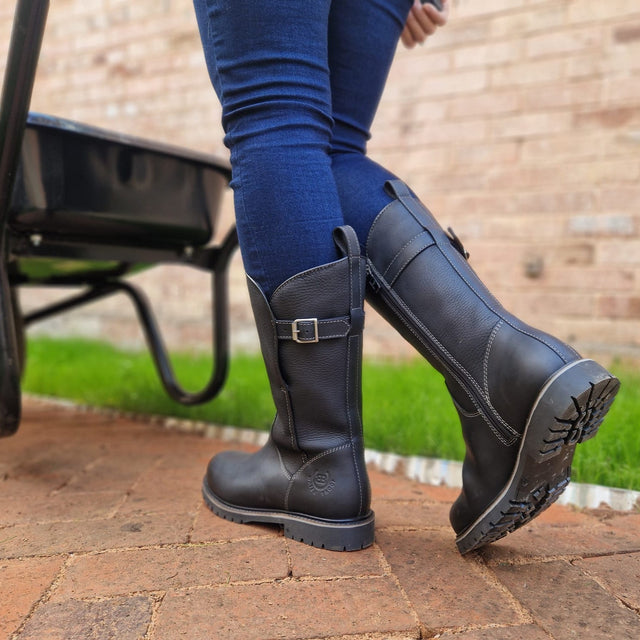 Black Quebec waterproof zip-up mid-calf boots showing the side zip