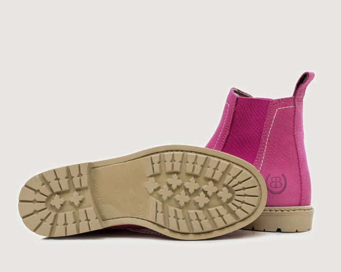 Bareback Toddy suede short boots in raspberry, showing the cleated rubber outsole