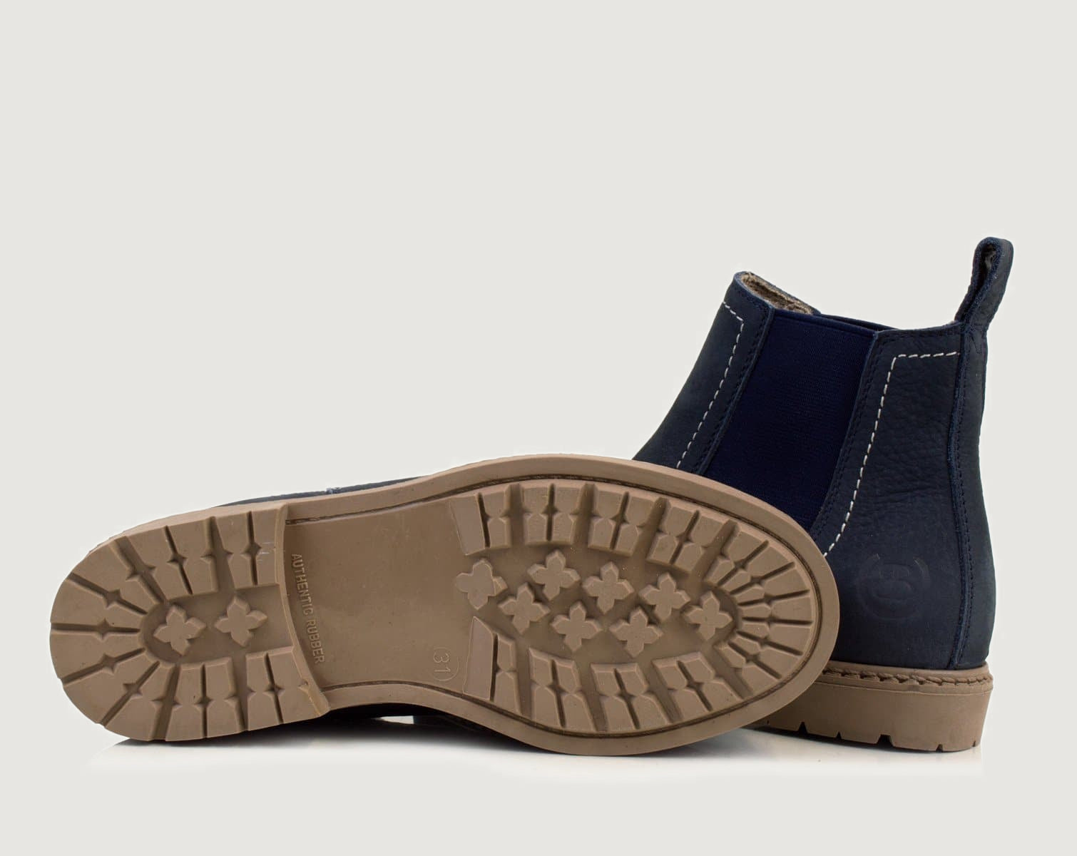 Bareback Toddy suede short boots in blue, showing the cleated rubber outsole