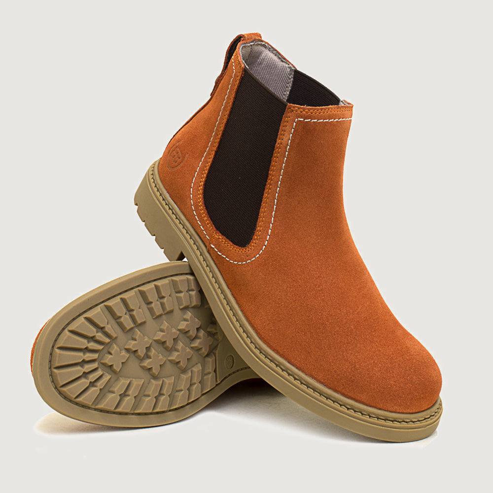 Bareback Toddy suede Chelsea boots in burnt orange, angled view showing the outsole
