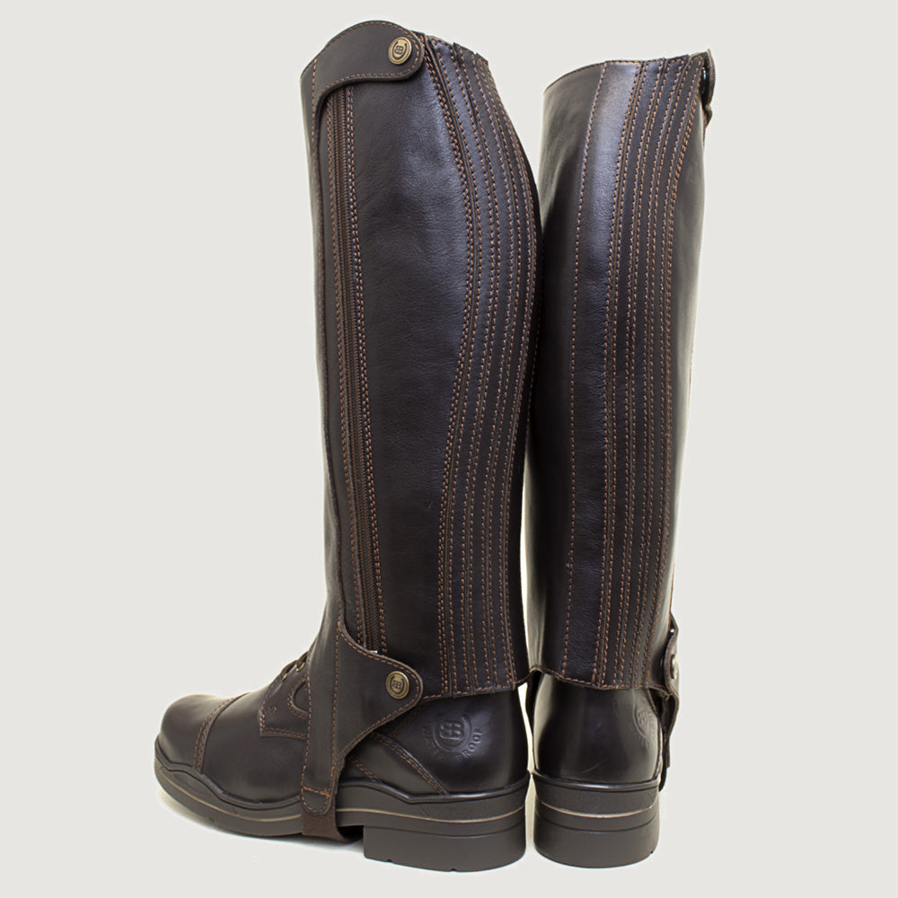 Bareback Kentucky half-chaps in polished brown leather, rear three-quarter view showing the zip