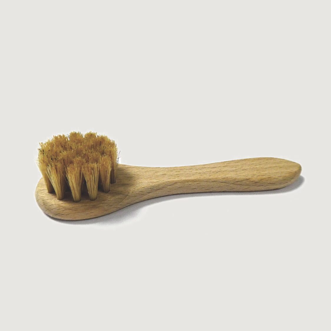 Natural bristle application brush for leather care