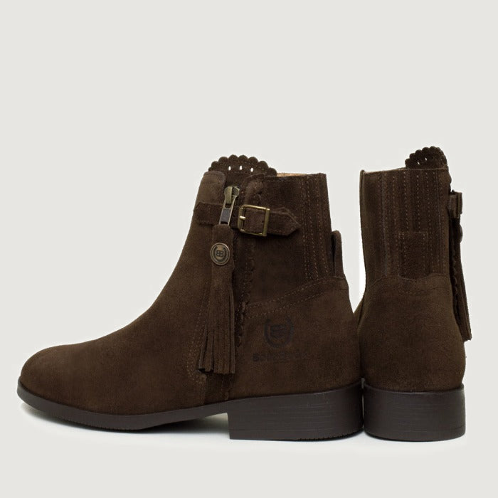 Bareback Valencia suede tassel ankle boots in brown, rear view showing the buckle and tassel