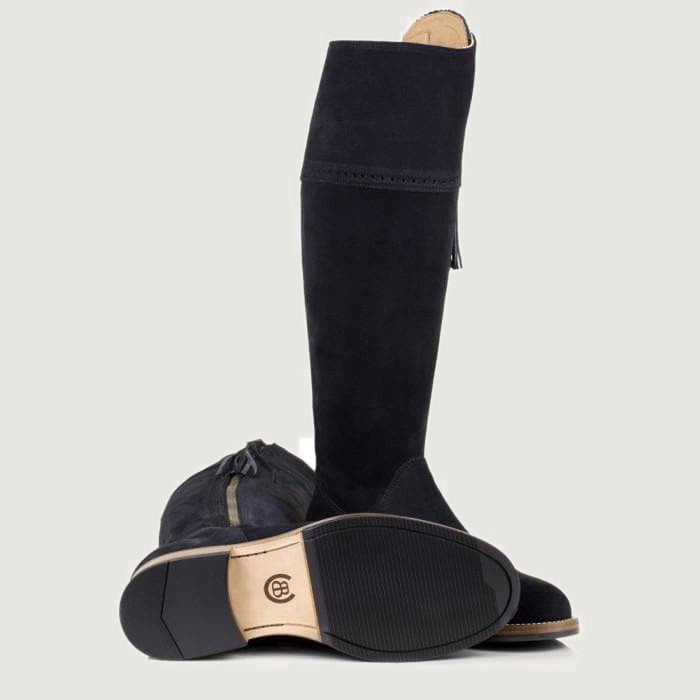 Bareback Sovereign suede tassel boots in black, showing the leather sole and heel