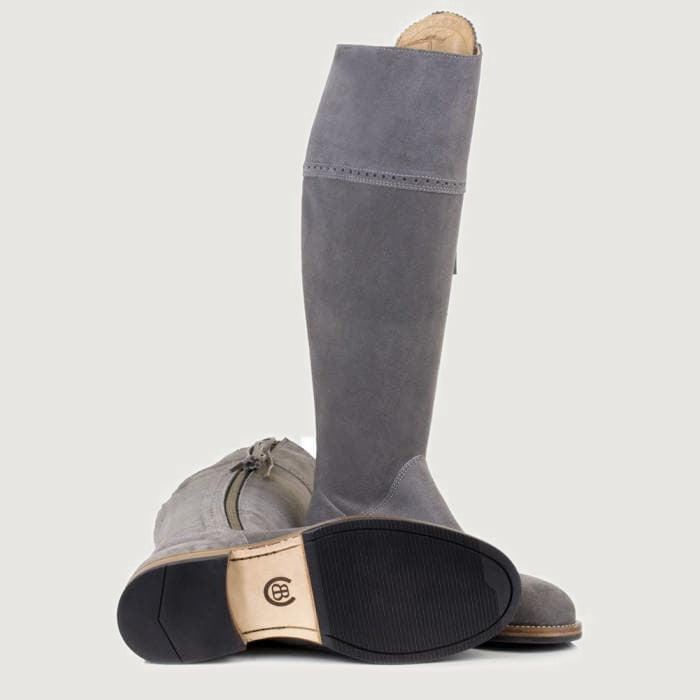 Bareback Sovereign suede tassel boots in grey, showing the leather sole and heel