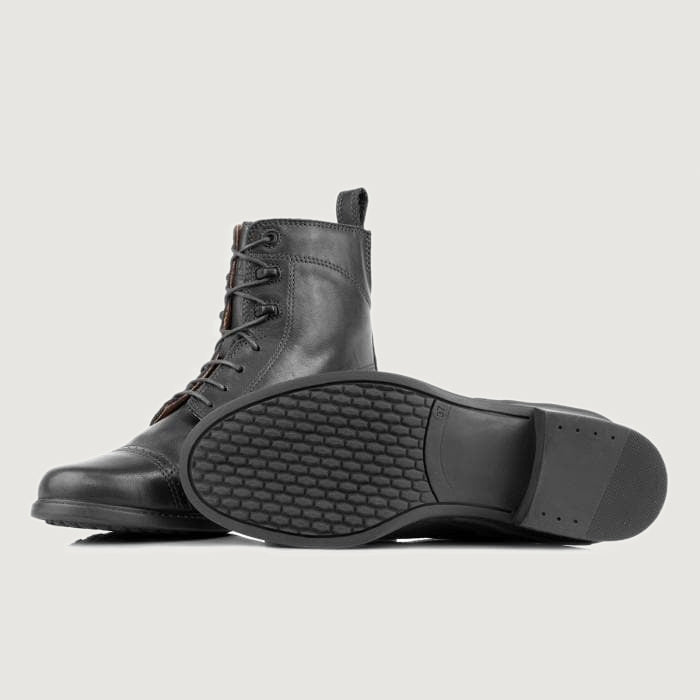 Bareback Windsor jodhpur riding boots in black leather, showing the patterned rubber outsole