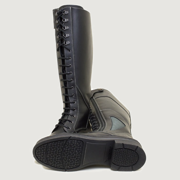 Bareback Kentucky long riding boots in black leather, showing the patterned rubber outsole