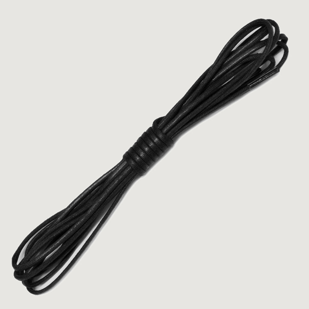 Bareback replacement boot laces in black, coiled waxed laces