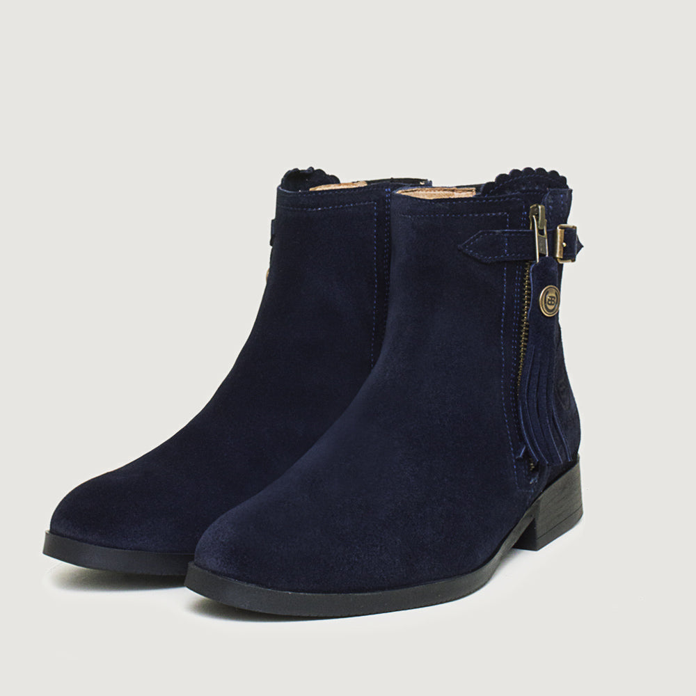 Bareback Valencia suede tassel ankle boots in navy, angled front view of the pair