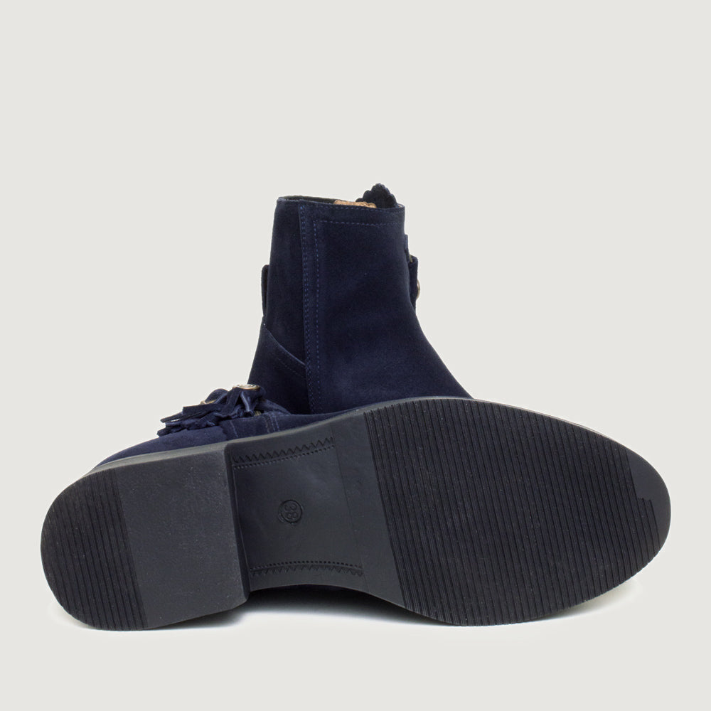 Bareback Valencia suede tassel ankle boots in navy, showing the stacked heel and sole