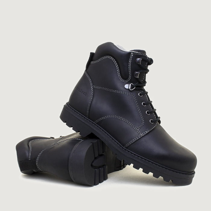 Bareback Buffalo walking boots in black leather, showing the cleated rubber outsole