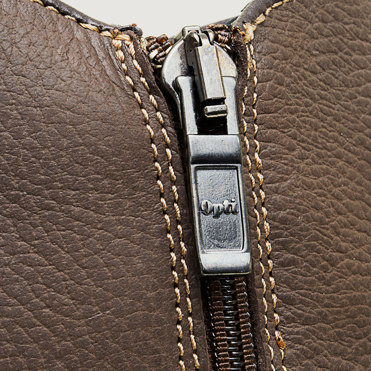 Bareback Quebec zip up waterproof ankle boots in brown leather, close-up of the zip pull and fastening