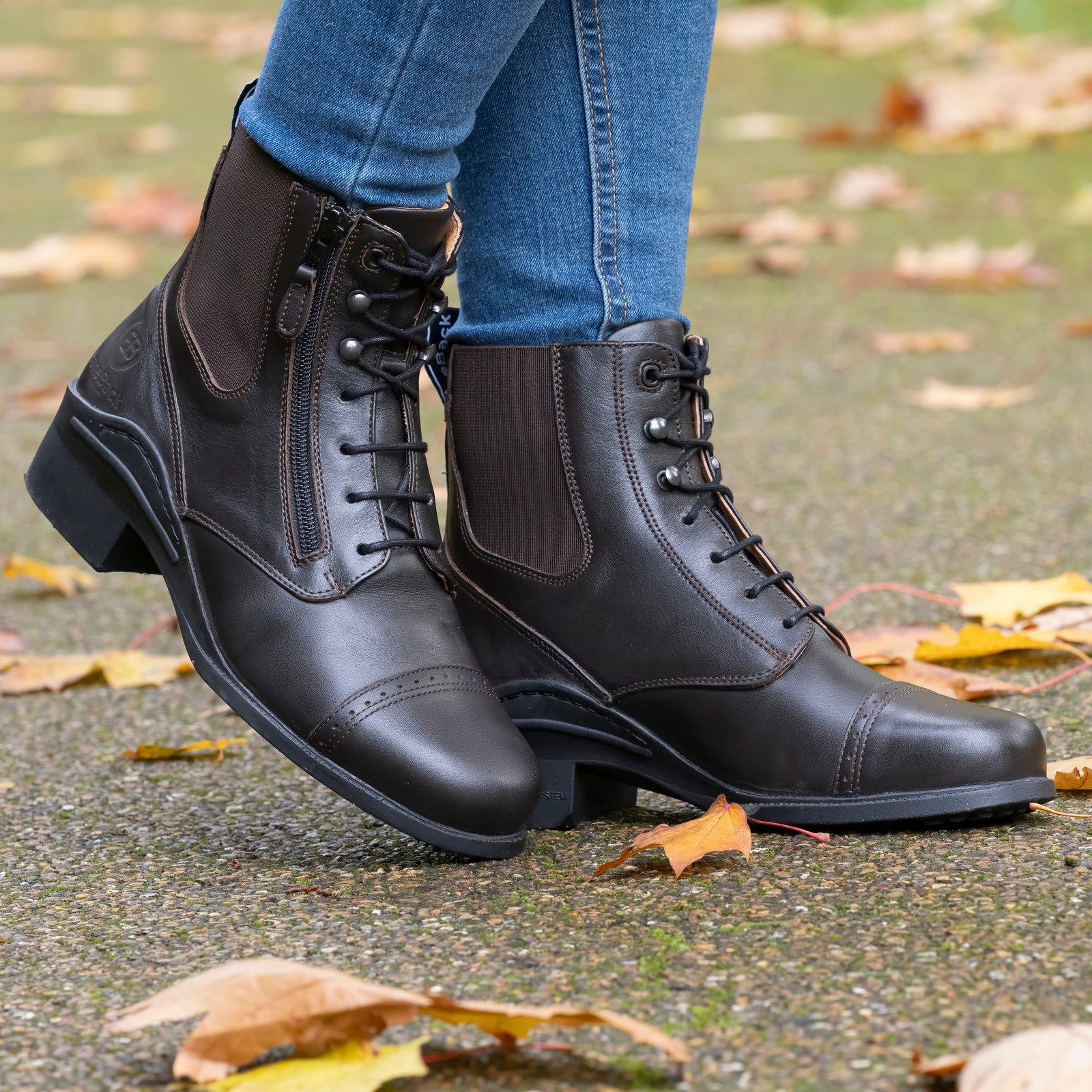 Bareback Bramham brown zip jodhpur boots worn outdoors in autumn