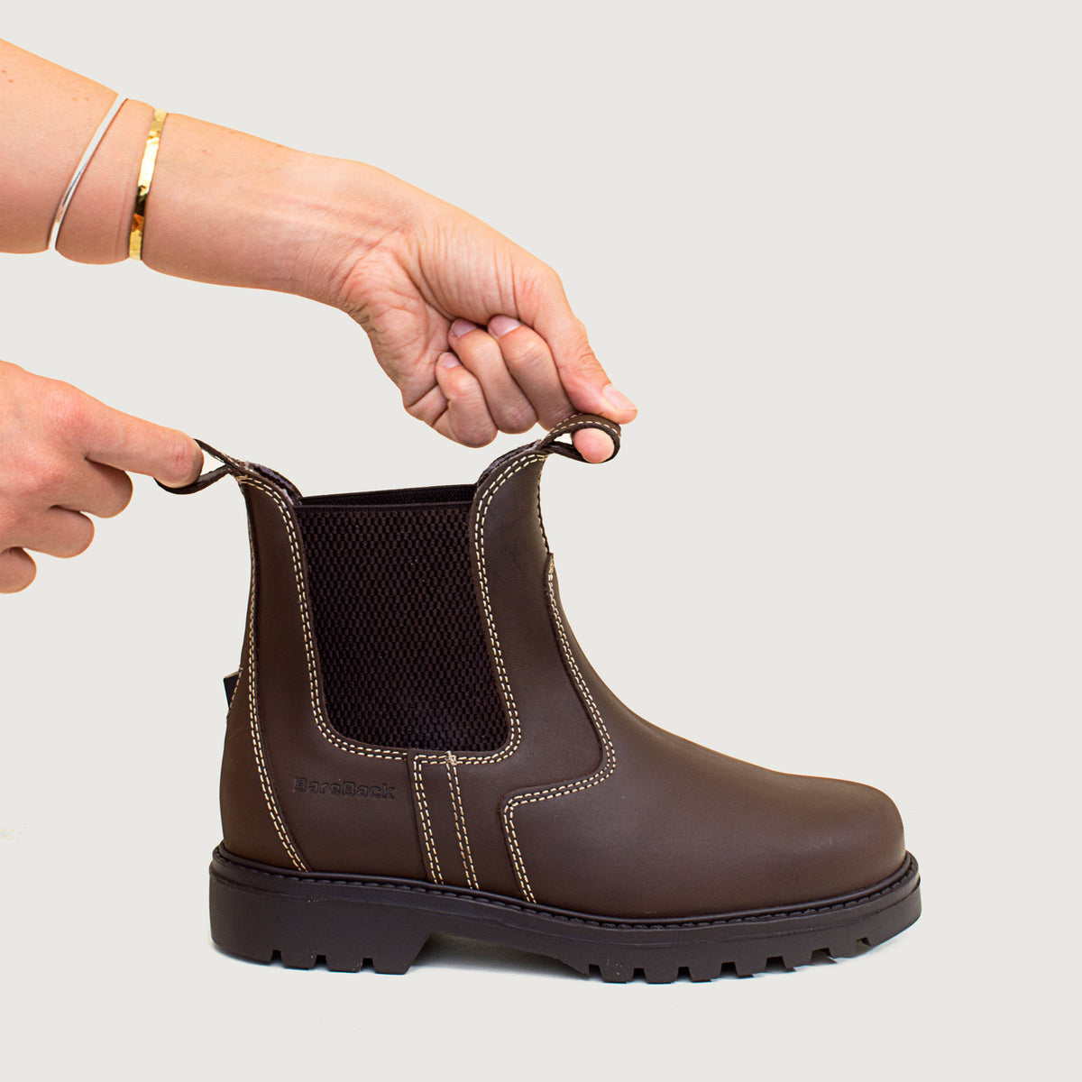 Bareback Bronx brown country yard boots, showing the pull tabs