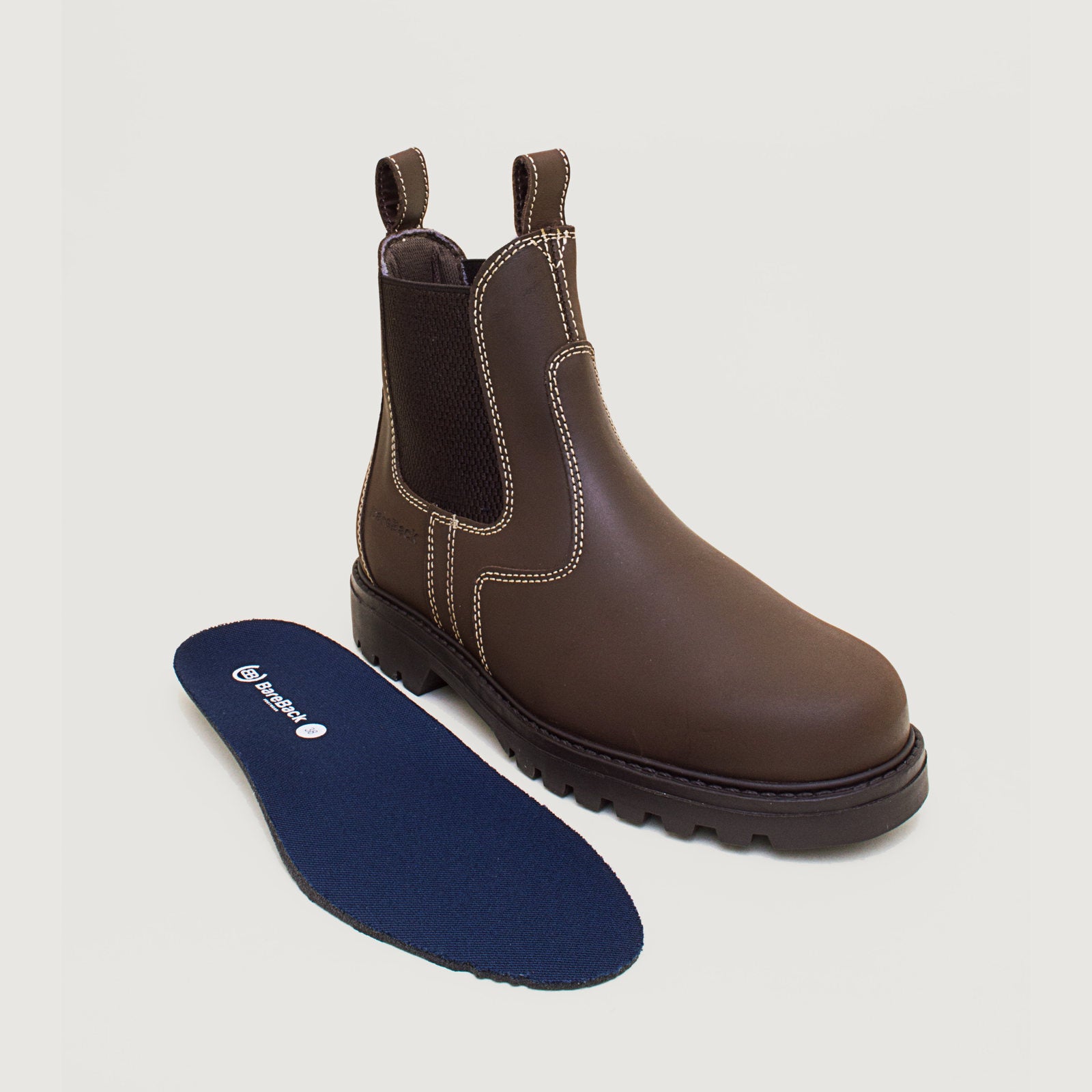 Bareback Bronx brown country yard boots, with the insole placed beside the boot
