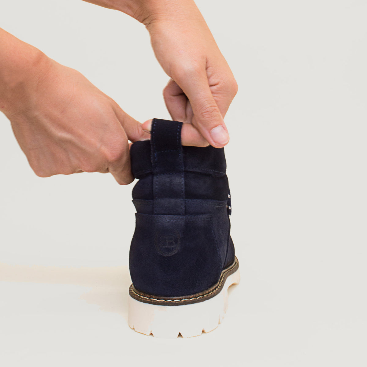 Bareback Chicago waterproof boots in blue leather, close-up of the heel pull tab