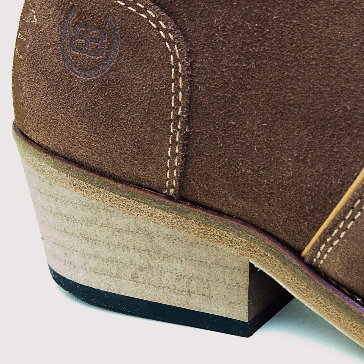Bareback Dixie cowboy boots in brown suede, close-up of the Cuban heel