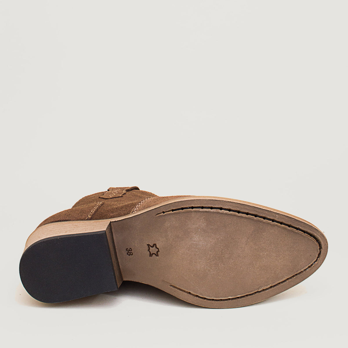 Bareback Dixie cowboy boots in brown suede, showing the outsole