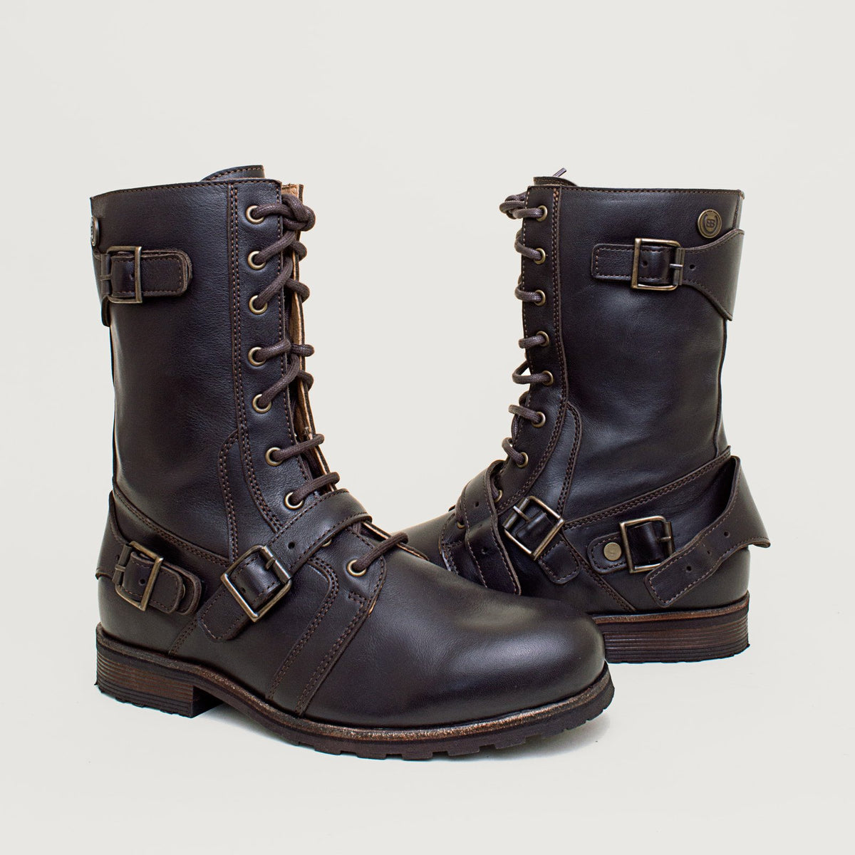 Bareback Harley boots in brown leather, showing the buckle strap open and closed