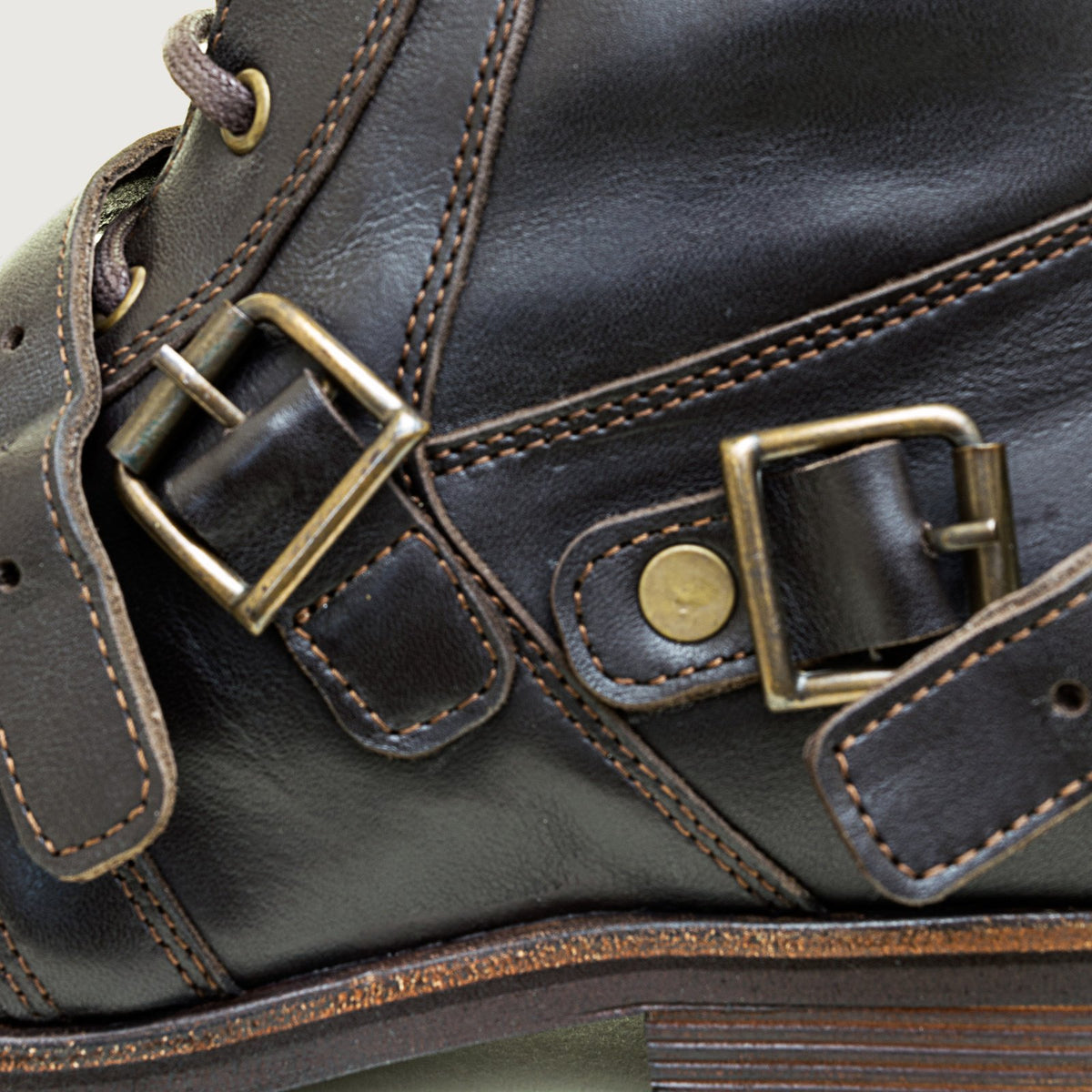 Bareback Harley boots in brown leather, close-up of the buckle strap open
