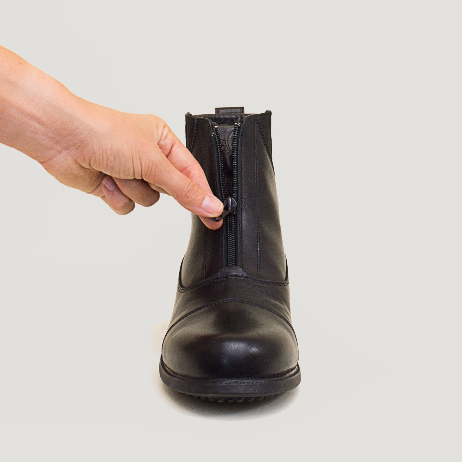 Bareback Idaho Storm waterproof jodhpur riding boots in black leather, close-up of the front zip