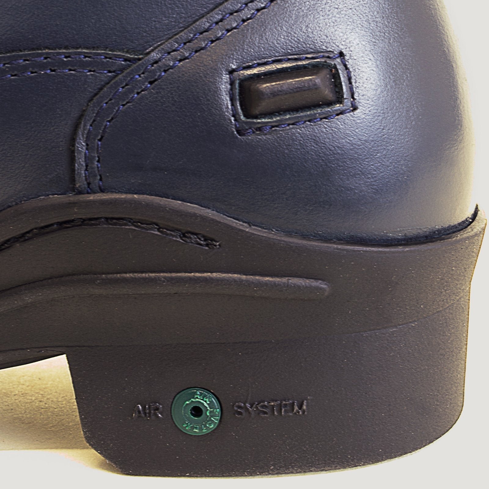 Bareback Idaho Storm waterproof jodhpur riding boots in navy leather, close-up of the outsole edge showing the Air System branding and stitching