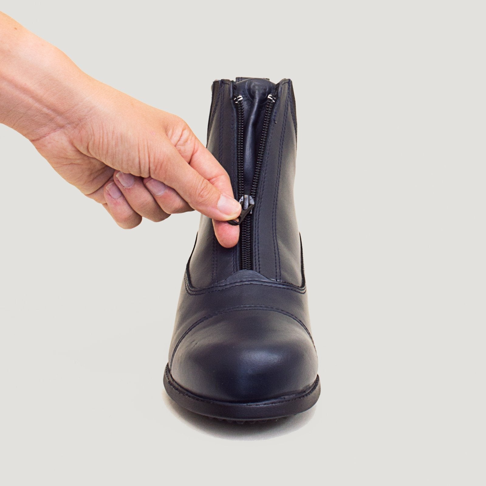 Bareback Idaho Storm waterproof jodhpur riding boots in navy leather, close-up of the front zip