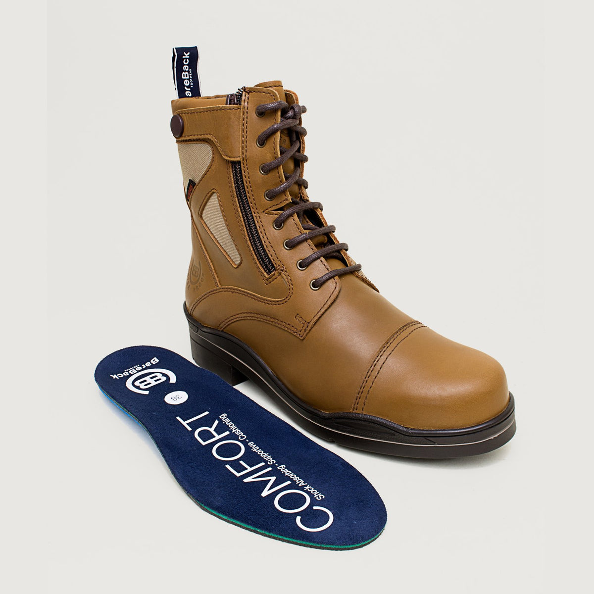 Bareback Kentucky Storm waterproof jodhpur boots in mocha, standing beside the removable Comfort insole