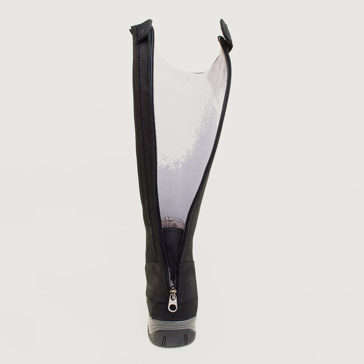 Rear view of a Montana black riding boot with the full-length zip open