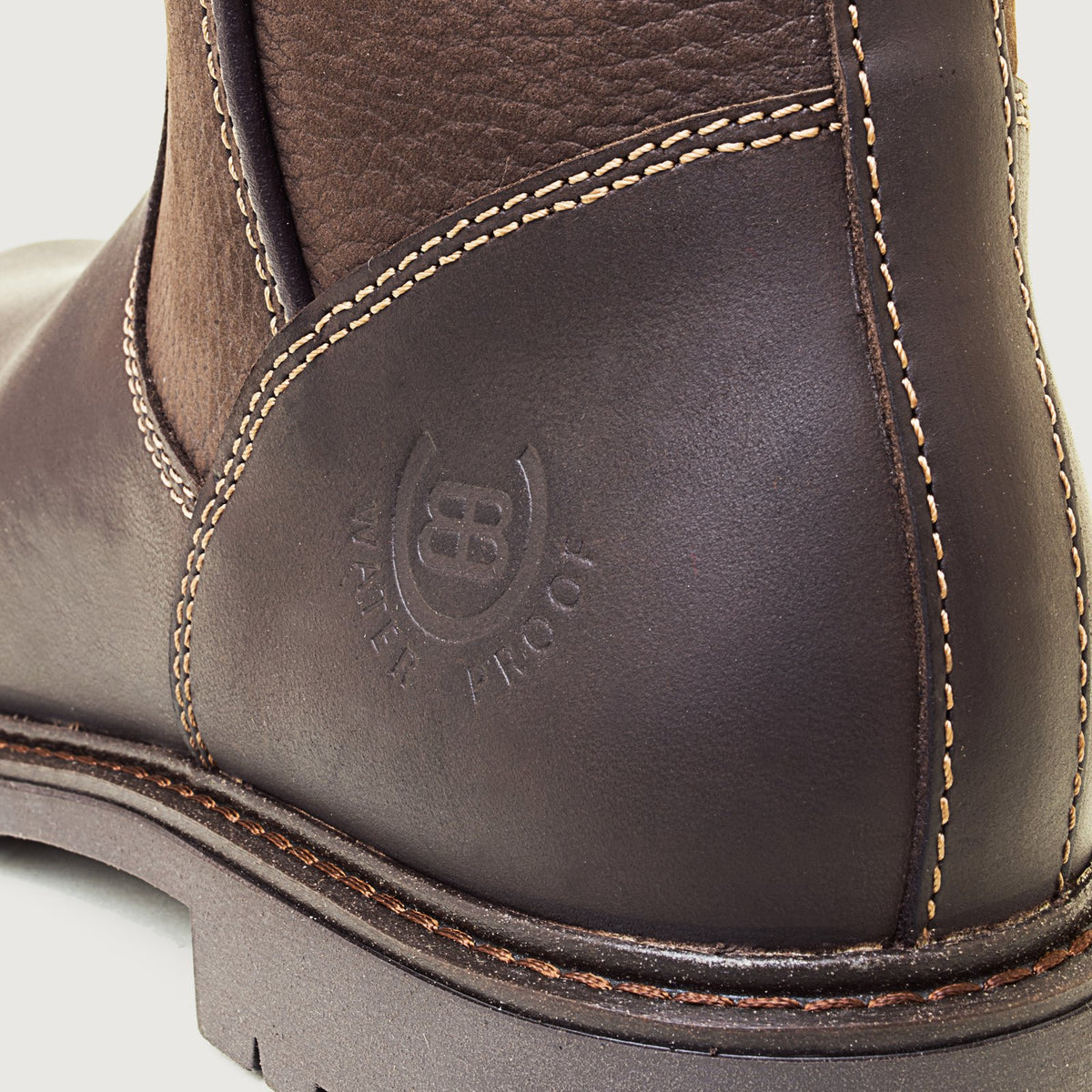 Bareback Quebec waterproof mid-calf boots in brown leather, close-up of the embossed waterproof stamp