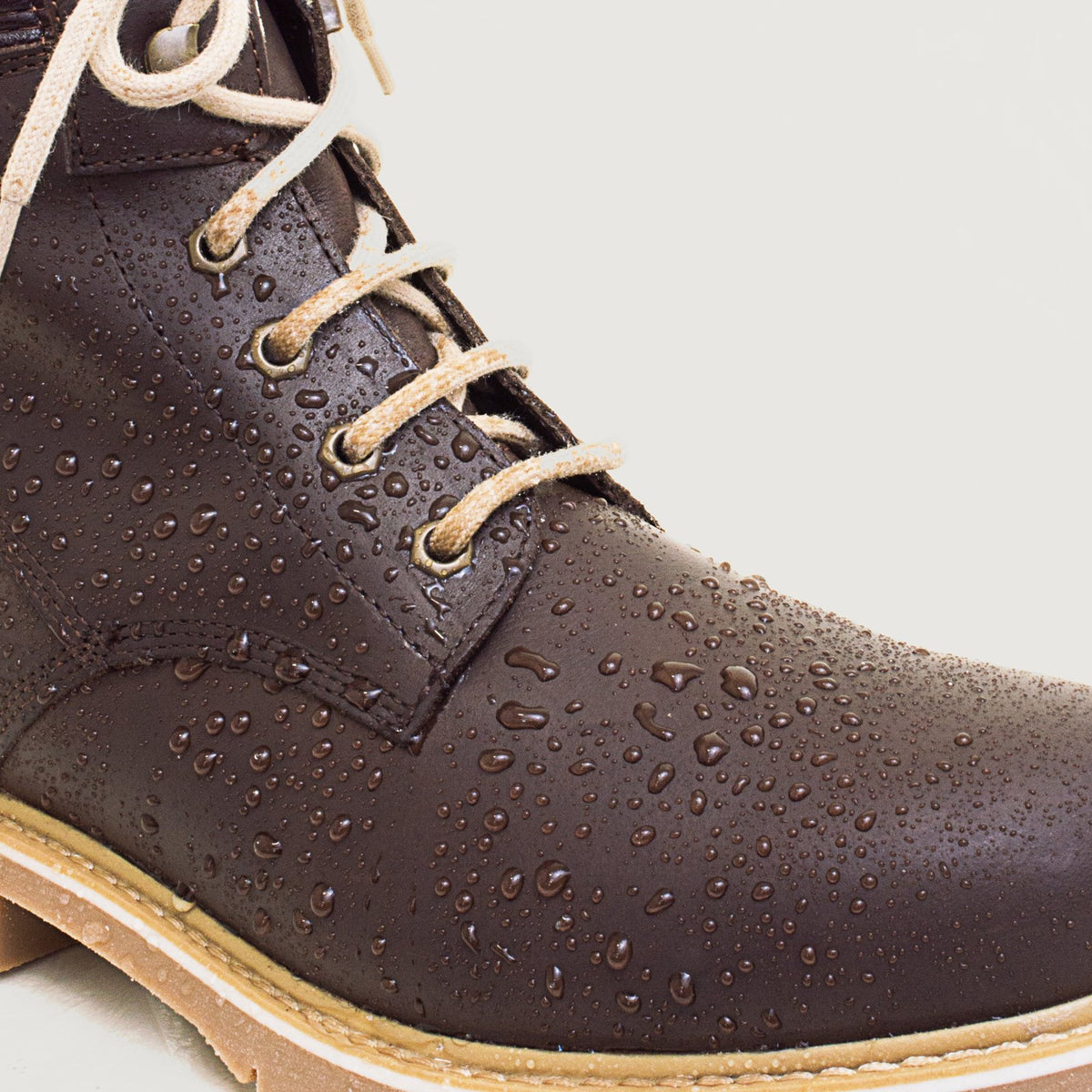 Bareback Rocky waterproof boots in brown, close-up of water droplets beading on the waterproof leather