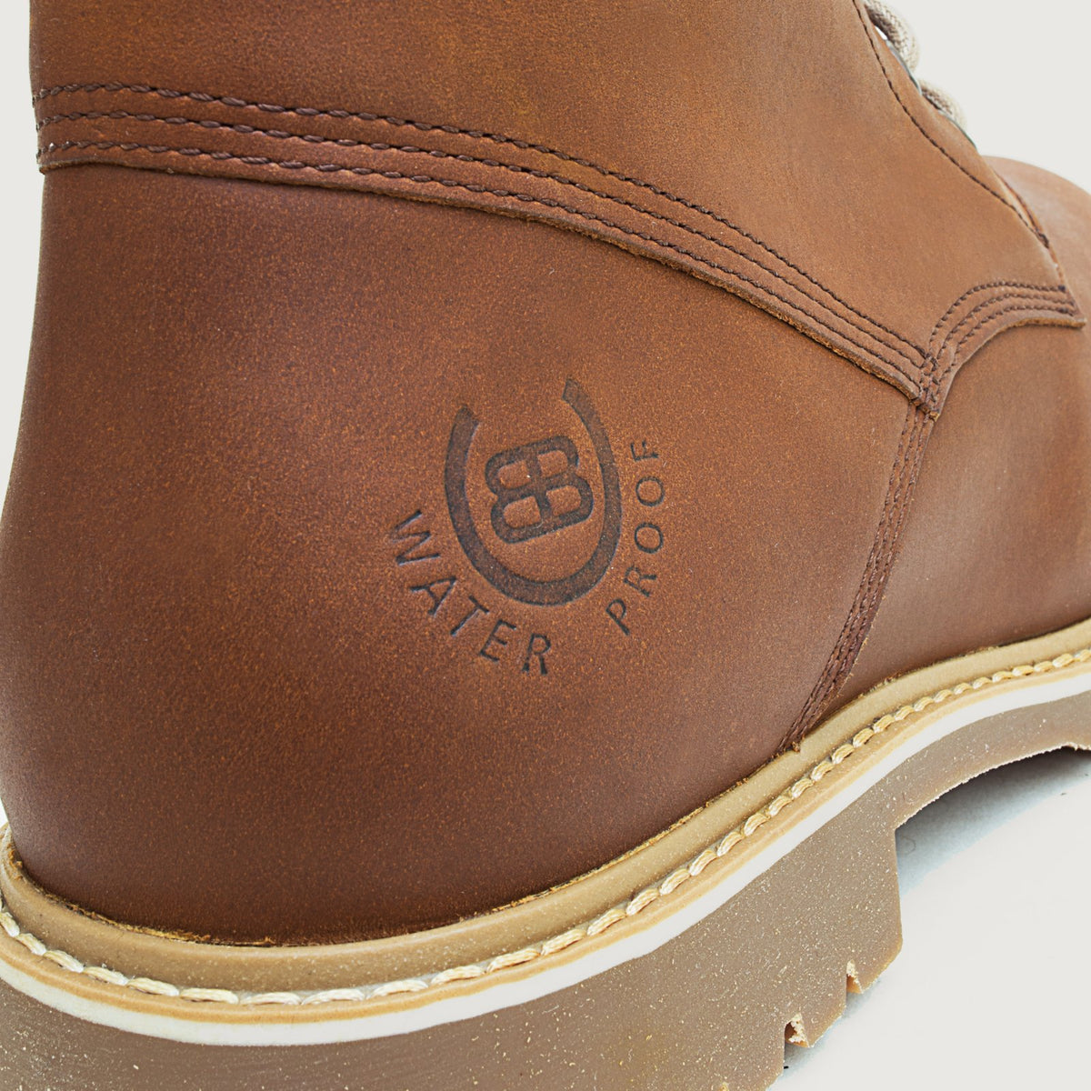 Bareback Rocky waterproof boots in copper, close-up of the embossed waterproof logo on the heel